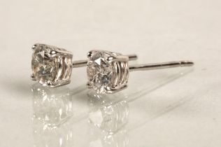 Pair of ladies 18ct white gold diamond stud earrings, each stone approximately 0.6 carat.