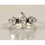 Ladies 18ct white gold three stone diamond ring central marquise cut 1 carat diamond, flanked by 0.