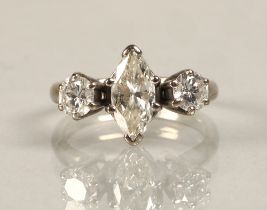 Ladies 18ct white gold three stone diamond ring central marquise cut 1 carat diamond, flanked by 0.