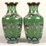 Pair of Japanese cloisonne vases, green ground with coiled dragon, 23cm high.