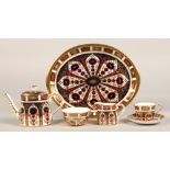 Royal Crown Derby miniature tea service in the imari pattern, comprising of teapot, sugar bowl,
