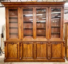 Victorian mahogany glazed four door bookcase over cupboard