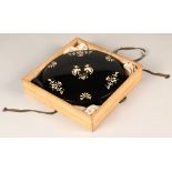 Japanese lacquered round writing box with mother of pearl inlay, interior with quill rest and bottle