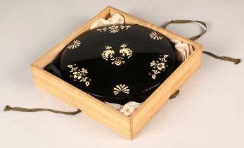 Japanese lacquered round writing box with mother of pearl inlay, interior with quill rest and bottle