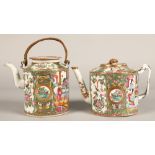 Two Canton teapots, each decorated with figure and floral panels.