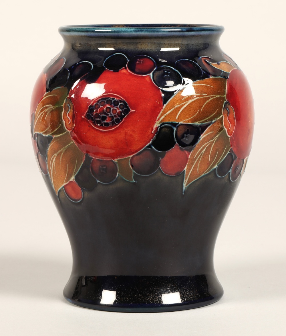 Moorcroft pottery vase of baluster form, pomegranate pattern, blue signature to base, 15cm high. - Image 2 of 9