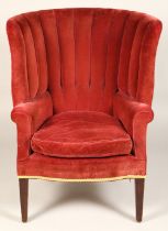 Wing back easy chair, ribbed back , upholstered in velour fabric, raised on tapered legs 64cm