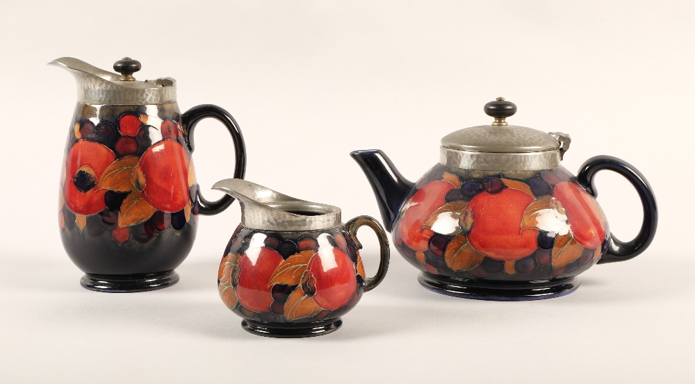 Moorcroft pottery Tudric pewter three piece tea service, pomegranate pattern designed by William - Image 2 of 22