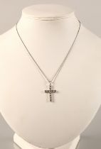 Ladies 18k white gold diamond cross pendant, on an 18ct white gold chain.
