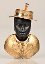 9ct gold mounted jazz singer pendant, total weight 15 grams, 5cm high.