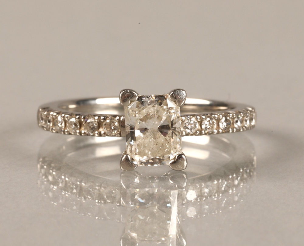 Ladies platinum 0.75 carat diamond solitaire ring with diamond shoulders, ring size K/L.
