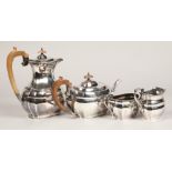 Four piece silver tea service, with hard wood stylised handles, assay marked Sheffield 1968, 1770