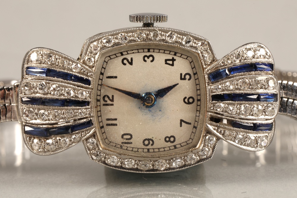 Ladies platinum and sapphire cocktail watch, numbered dial surrounded by small diamonds, with four - Image 2 of 4