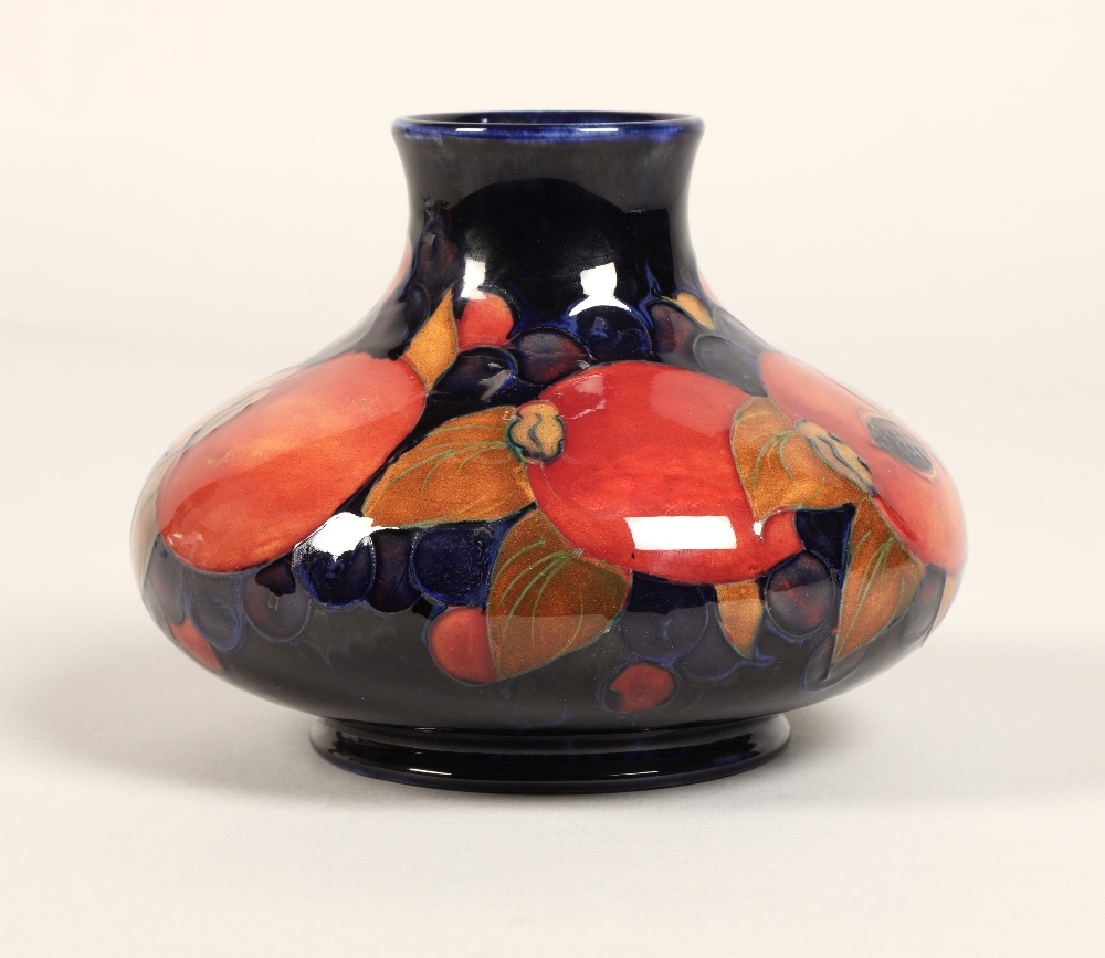 Moorcroft pottery vase, of squat form, blue ground in the pomegranate pattern, impressed mark with - Image 6 of 12