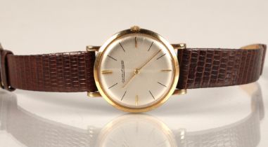 Gents 9ct gold Jaeger-le-coultre wrist watch, on a brown leather strap.