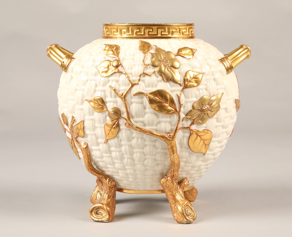Royal Worcester cream and gilt weaved basket vase, 21cm high.