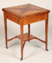Edwardian inlaid mahogany envelope games table with fitted drawer, inlaid with stylised flowers