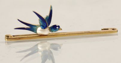 Ladies 15ct gold bar brooch with mounted enameled swallow, 3.9 grams.