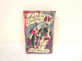 MACKENZIE COMPTON.  Whisky Galore. Orig. maroon cloth in very chipped unclipped d.w. 1st ed., 1947.