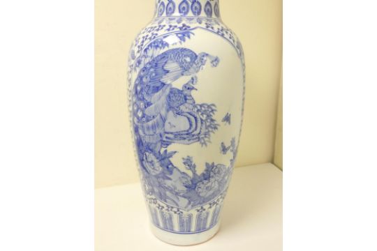 Large oriental porcelain blue and white vase decorated with peacocks, scrolls and foliage, the - Image 2 of 5