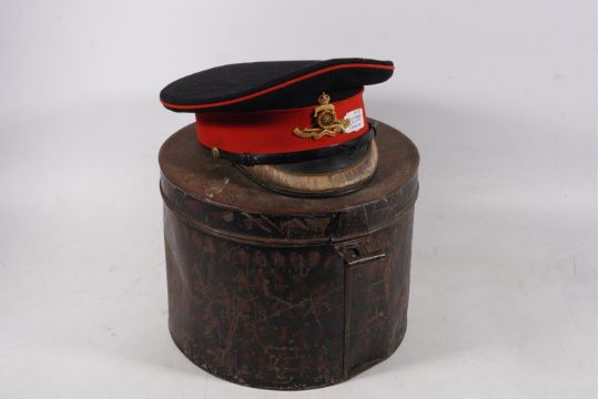 Peaked cap with bullion wire visor braid having Royal Artillery cap badge, held in a toleware case - Image 1 of 7