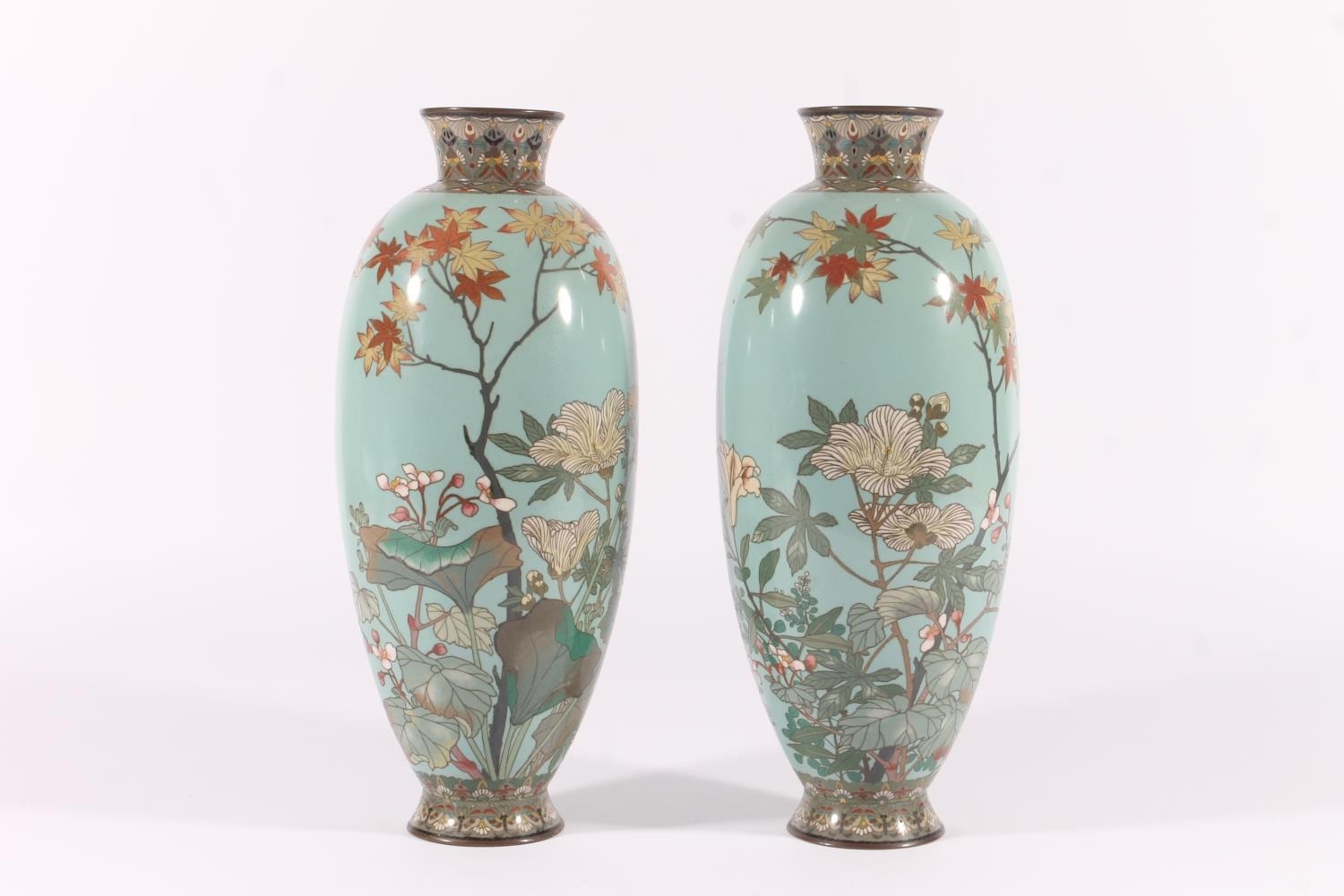 Pair of Japanese cloisonne vases, late Meiji period, of ovoid form decorated with polychrome foliate