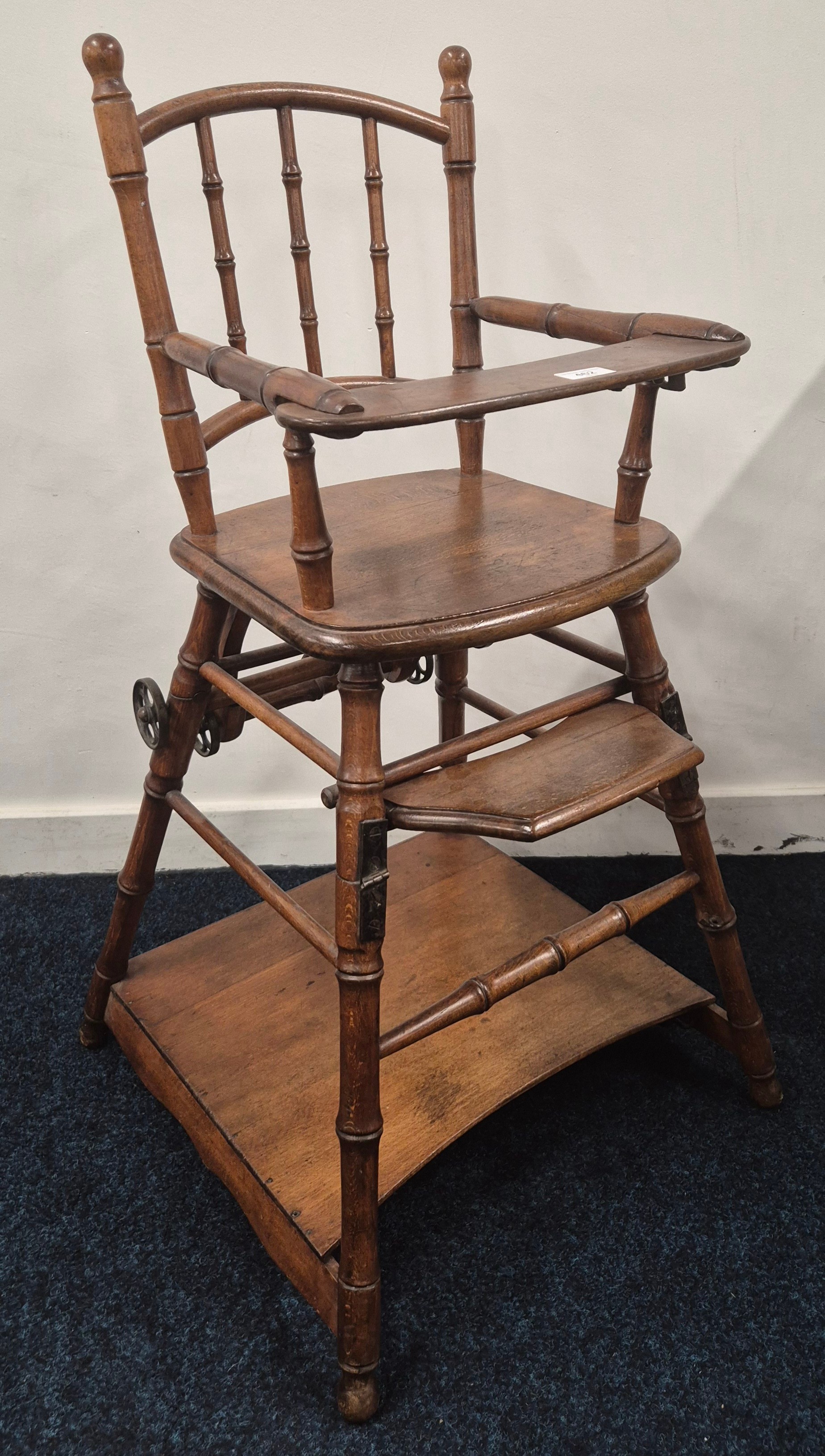 Antique stained oak childs highchair/ desk.