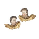 Pair of winged putti heads, South German, mid 18th century