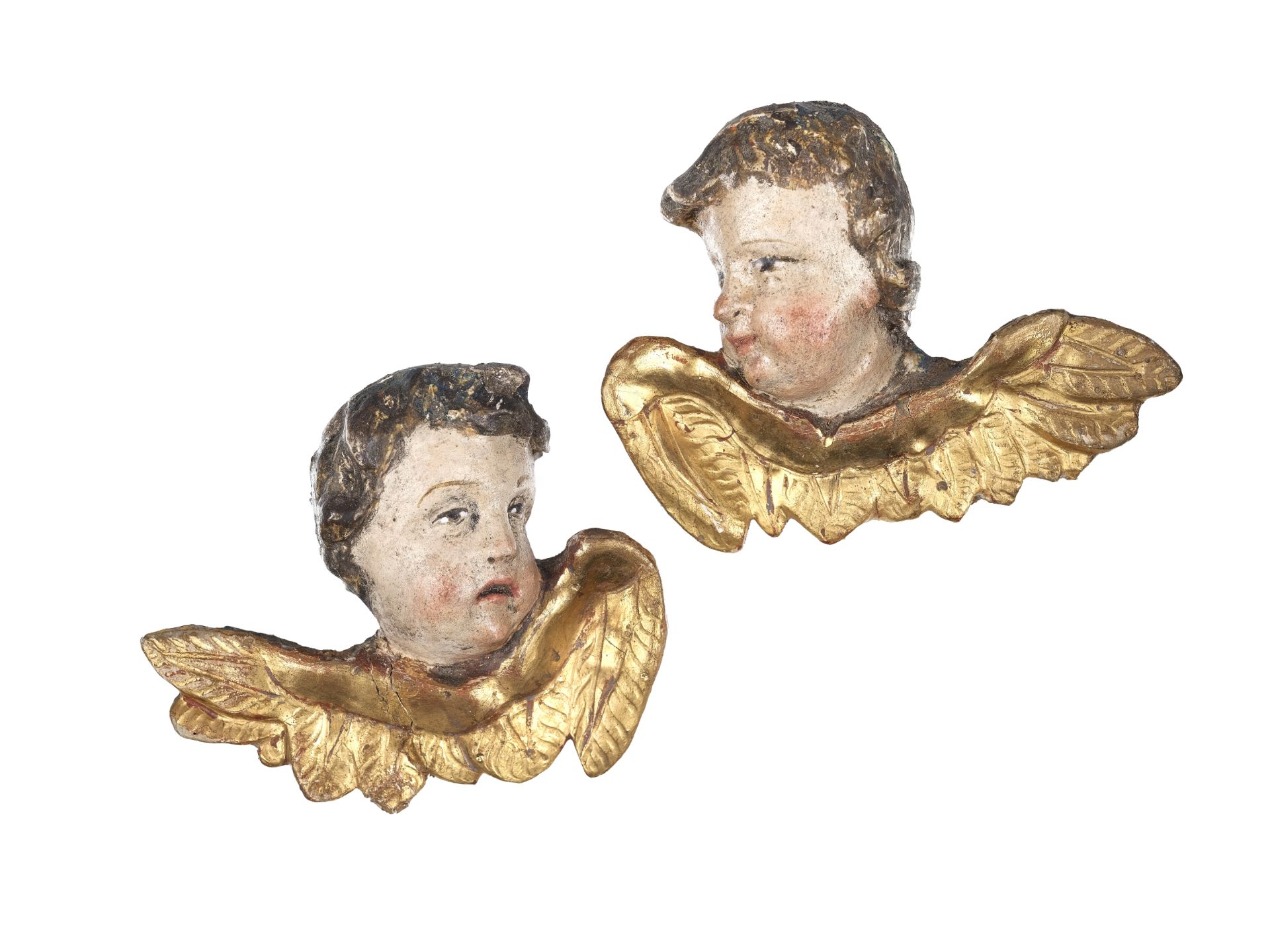 Pair of winged putti heads, South German, mid 18th century