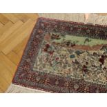 Small carpet with hunting scenes