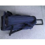 Traveling bag with handle and wheels (Delivery Band A)