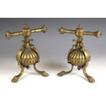 A pair of Arts & Crafts cast brass andirons in the manner of W.A.S. Benson, late 19th or early