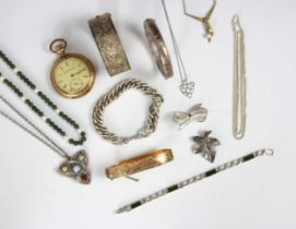 A selection of costume jewellery, including a rolled gold, hinged bangle with engraved detail (at