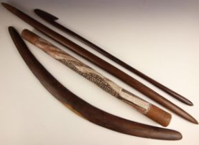 An Australian Aboriginal club of large proportions, 105cm long, with a boomerang, 91cm long, a spear