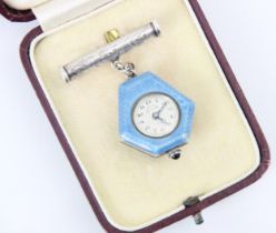 A 20th century Swiss guilloche enamel watch or pendant, the circular dial with Arabic numerals set