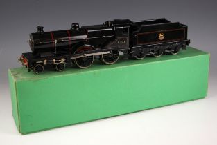 An 'O' gauge electrically powered model railway locomotive and tender numbered '41109' in black