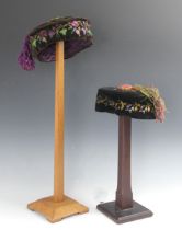Two mid-Victorian velvet smoking hats, circa 1850, each velvet hat with quilted lining and