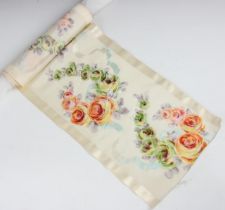 A polychrome printed figured silk taffeta ribbon, with all over repeating floral motifs, satin