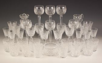 A part suite of Waterford Crystal in the 'Clare' pattern, comprising: six hock glasses, 18.5cm high,