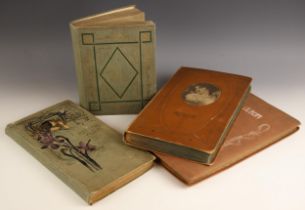 A collection of over five hundred Edwardian era postcards to four Art Nouveau albums, to include