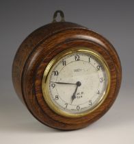 An oak cased eight day 'G.W.R' pork pie wall clock, mid 20th century, the 8cm painted dial