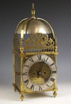 A brass cased eight day twin fusee lantern form clock, late 19th century, the substantial overhead