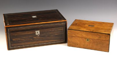 A mid 19th century coromandel stationery box, the hinged cover centred with an inlaid mother of