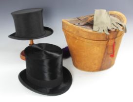 A Gentleman's silk top hat by Woodrow of Liverpool, approximate internal circumference 56.5cm,