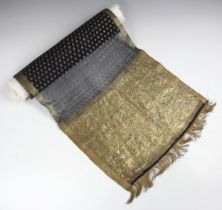 An exceptional Indian long black silk gauze stole, early 19th century, with deep gold borders