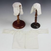 Two fine lawn caps, 19th century, one with intricate Hollie Point intercessions depicting a crown,