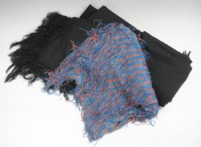 A large fine black wool shawl, circa 1840, 180cm x 360cm, (at fault), with a square silk machine