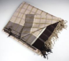 A wool and silk long shawl, circa 1840-1850, with an all-over checked design in lavender, gold,