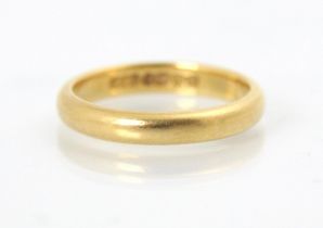 A 22ct wedding band, stamped H&M, Birmingham 1953, ring size L, 4.2gms