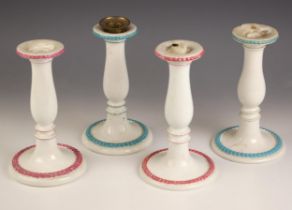 A set of four Wedgwood candlesticks, 19th century, each of baluster form, raised upon a spreading
